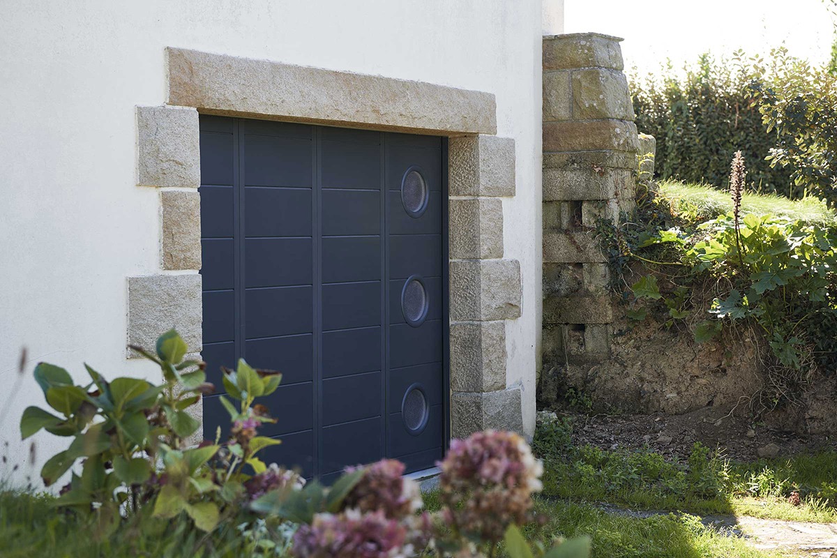 Porte de garage coulissante gamme Prestige/Confort modèle Lituanie/Jersey - RAL7016